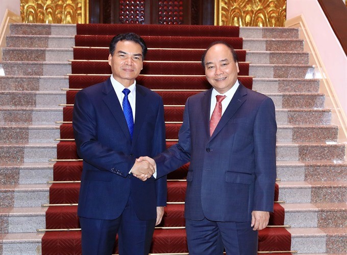 PM hosts head of Laos Government Office