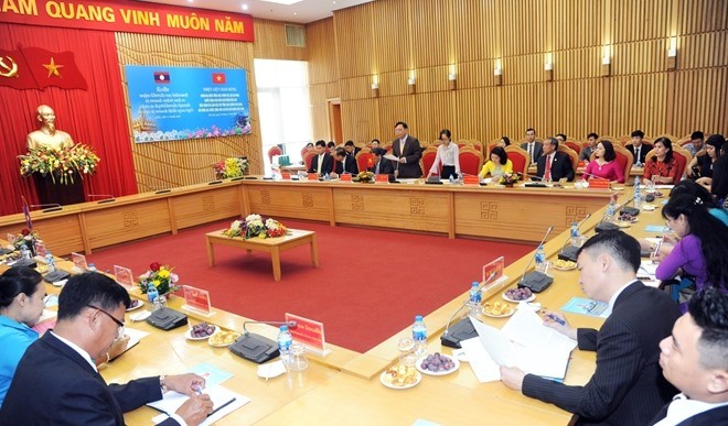 VN and Laos ministries boost ties in various areas