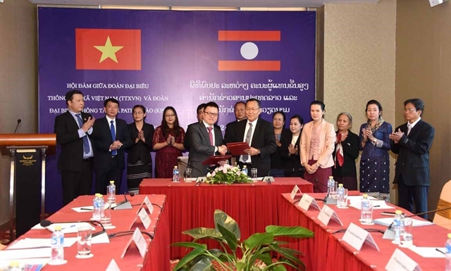 Vietnamese, Lao news agencies forge cooperation to raise information quality