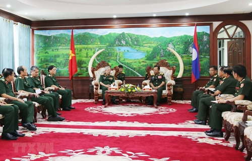 Vietnam, Laos hold first defense policy exchange