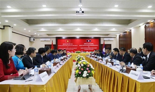 Government Offices of Vietnam, Laos step up cooperation