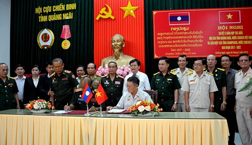 Vietnam, Laos war veterans enhance cooperation