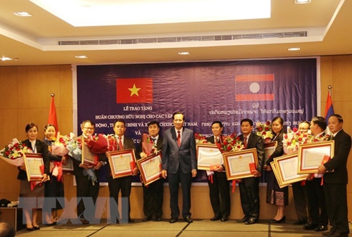 Vietnam, Laos discuss boosting labor, social welfare cooperation