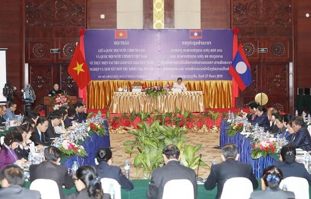 Legislatures of Vietnam, Laos share experience at joint workshop