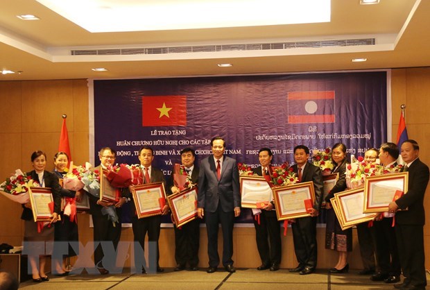 Vietnam, Laos discuss boosting labour, social welfare cooperation