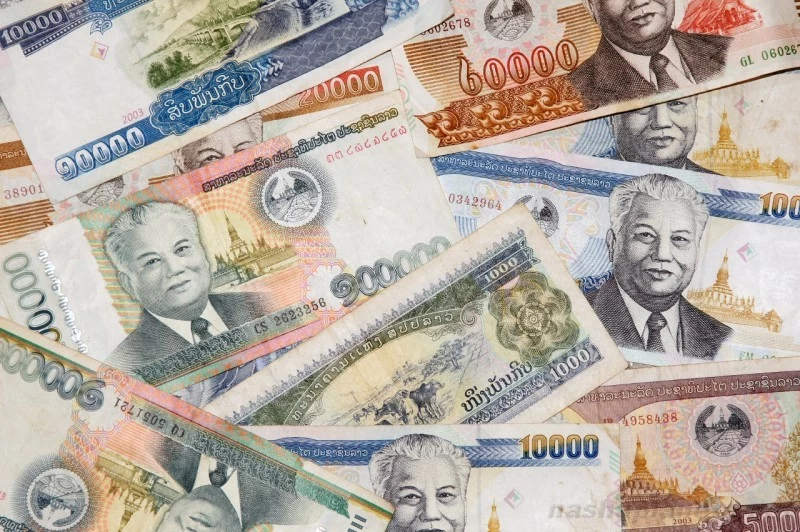 Vietnam and Laos Explore the Use of Local Currencies for Trade and Investment